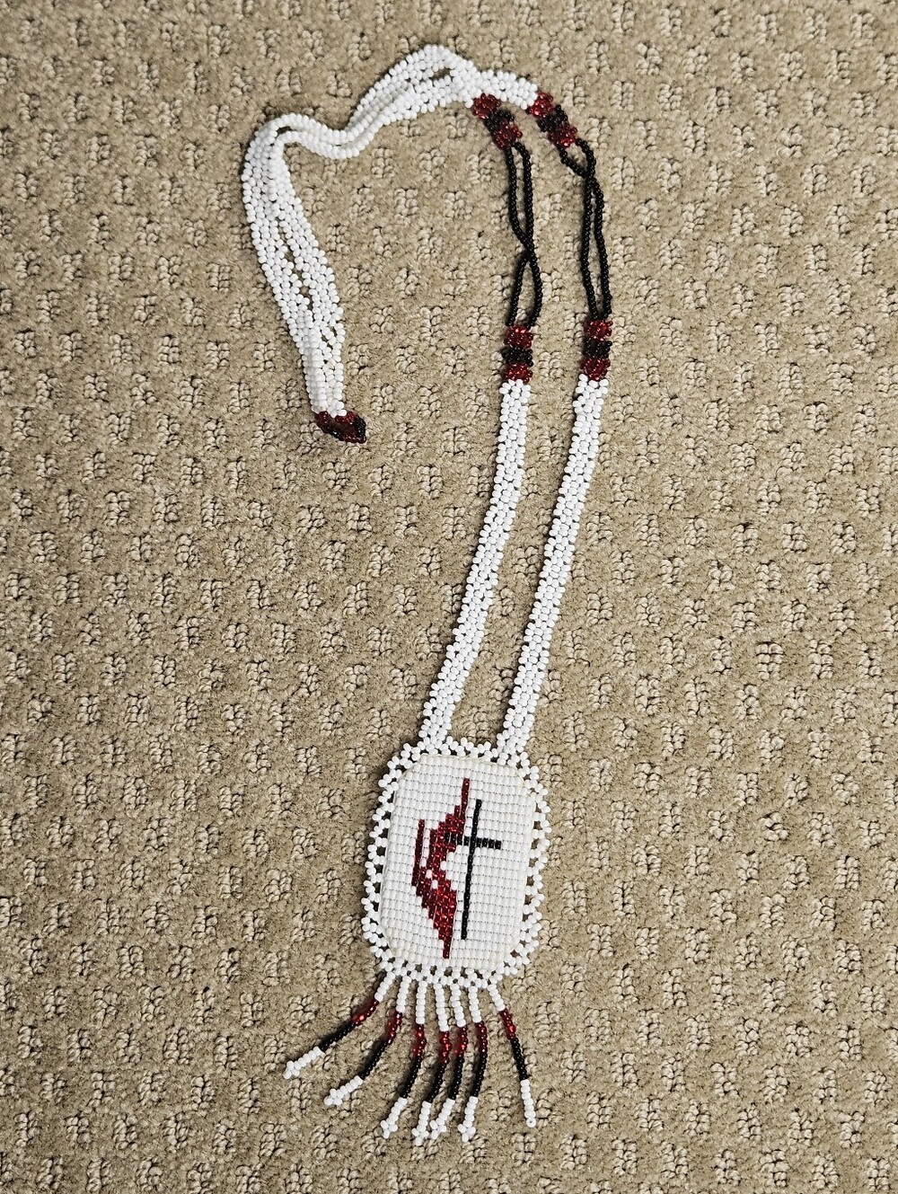 handmade by Choctaw beaded necklace with UMC cross with flame